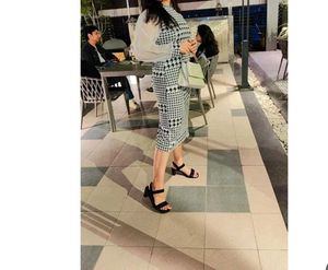 black white mid length dress