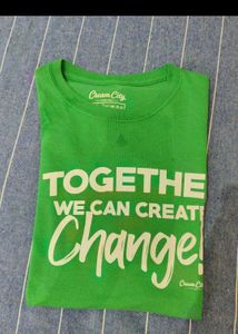 Green Tshirt with Tan shorts