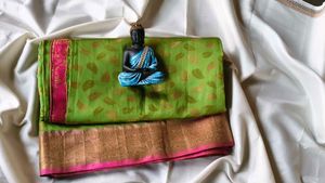 Vibrant Green Saree with Pink Border