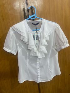 Elegant White Ruffled Blouse