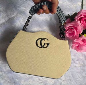 BRAND NEW Chic Beige Mini Handbag with Statement C