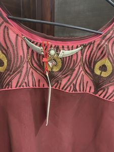 Elegant Maroon Kurta with Peacock Neckline