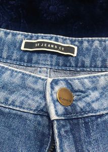 Ripped Knee Denim Jeans