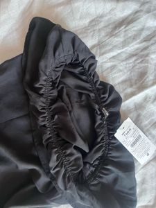 Chic Black Off-Shoulder Ruffle Top