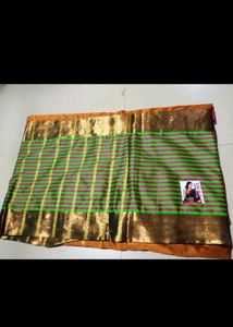 Vibrant Striped Silk green golden Saree