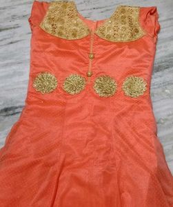 Elegant Coral Dress with Gold Embellishments