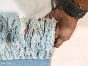 Light Wash Denim Fringed Mini Skirt
