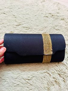 Elegant Black Clutch with Gold Embellishments