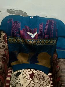 10. Vintage Cityscape & Bird Knit Sweater