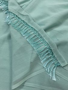 Elegant Turquoise Saree with Purple Blouse