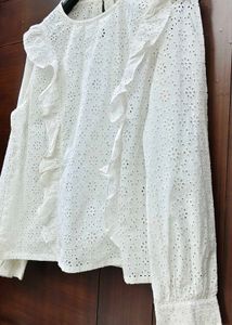 White eyelet ruffle long sleeve top