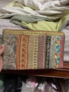 Embroidered Clutch with Tassels