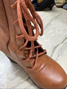 Stylish Brown Lace-Up Boots with Embellishments