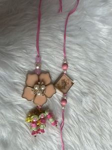 Unique Rakhi Set with Flower Charm