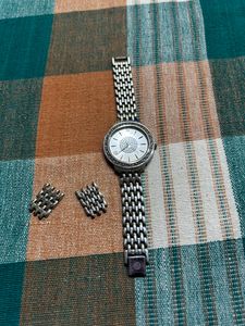Elegant Silver Tone Watch with Rhinestone Accents