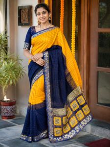 Yellow printed saree with stiched blouse ...