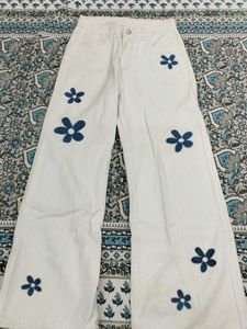 White Flare Jeans with Floral Appliques