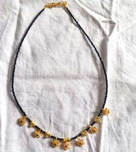 Elegant Black Beaded Necklace with Pendants