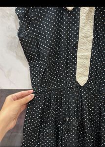 black polka dot mini dress