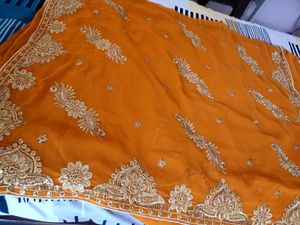 Elegant Orange Embroidered Saree
