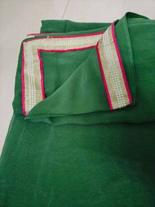 Elegant Green partywear Saree with Pink Border