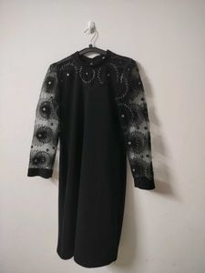 Elegant Black Dress with Sheer Embellished Sleeves