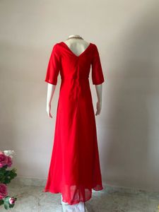 Elegant Red Gown with Embellished Neckline