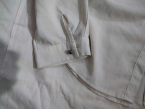 white pleated shirt