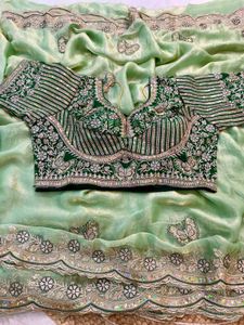 Elegant Pastel Green Embroidered Saree