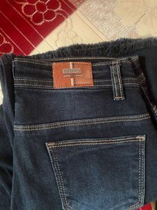 Distressed Dark Wash Flare Jeans