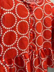 Vibrant Red Peplum Top with Circles