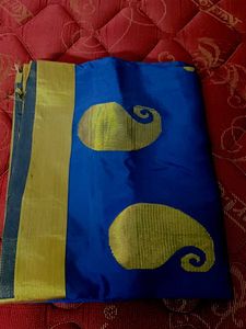 Vibrant Blue Saree with Golden Paisleys