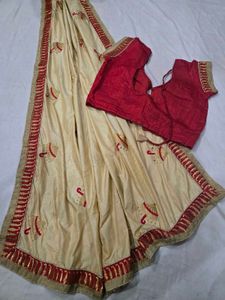 Elegant Cream Saree with Red Border