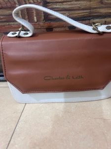 Chic Brown & White Handbag