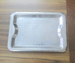 New  unused  stainless  steel  designer  tray