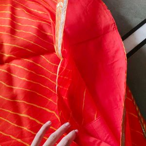 Vibrant Orange Saree with Gold Border