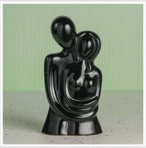 Modern White Couple Sculpture