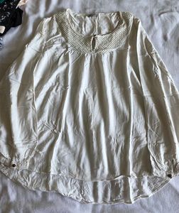 Elegant White Top with Textured Yoke
