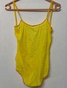 Yellow one-piece swimsuit with a deep scoop back