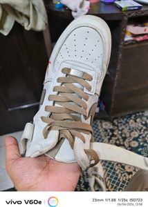 White Sneakers with Brown Laces