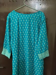 Ferozi blue jacketed kurta with beautiful print