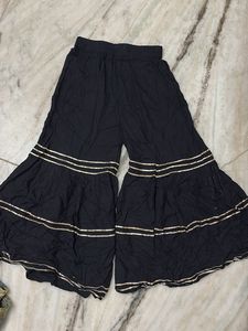 Stylish Black Palazzo Pants with Gold Trim