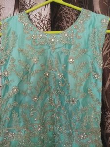 Stunning Teal Sequin Gown