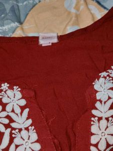 Maroon elegance paired with delicate Chikankari