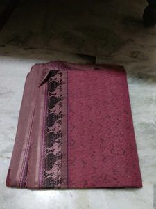 Elegant Red Saree with Intricate Border