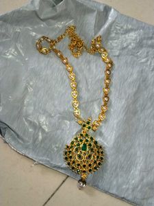 Stunning Gold Necklace with Green Stones