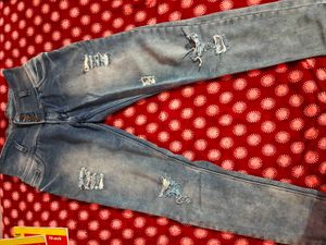 Distressed Blue Denim Jeans