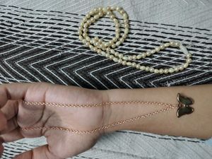 Elegant Pearl Necklace and Butterfly Pendant