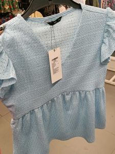 Baby Blue Textured Peplum Top