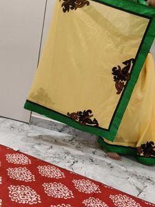 Elegant Yellow Saree with Green Border